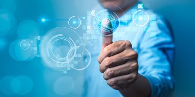 service_0004_businessman-using-fingerprint-identification-to-ac-2022-11-09-15-07-11-utc.jpg